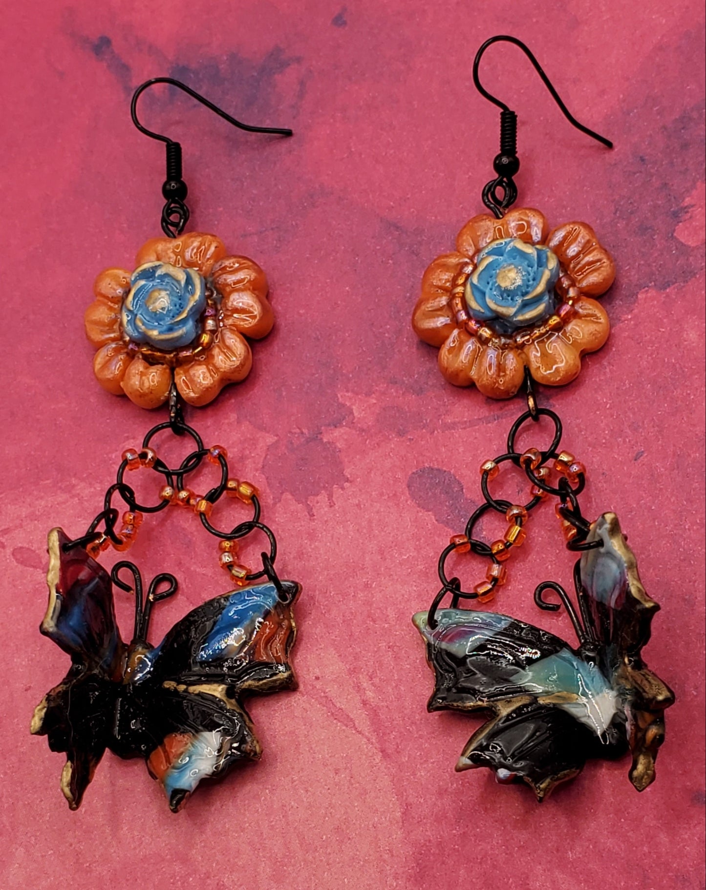 Orange Sunflower Marbled Black Butterfly