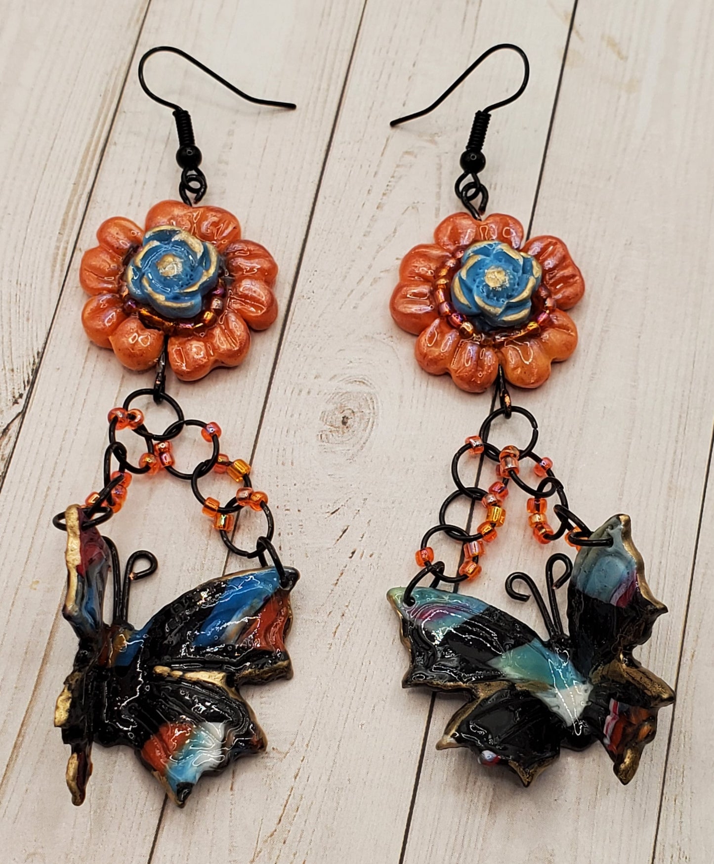 Orange Sunflower Marbled Black Butterfly